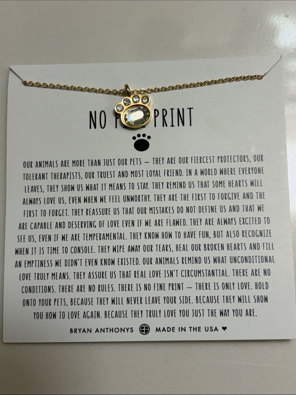 Bryan Anthonys Gold Paw Print Necklace with Clear CZ Crystal